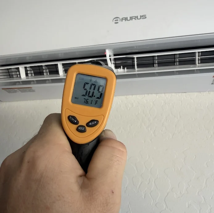 Checking an Aurus mini-split with an infrared thermometer